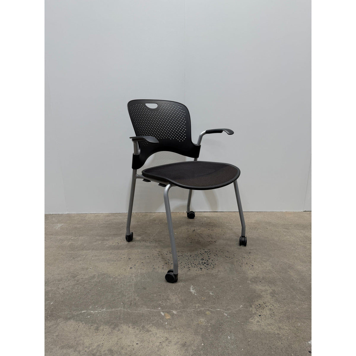 Herman Miller Caper Stacking Chair, Black, Fixed Arms, Castors - thegoodchairs