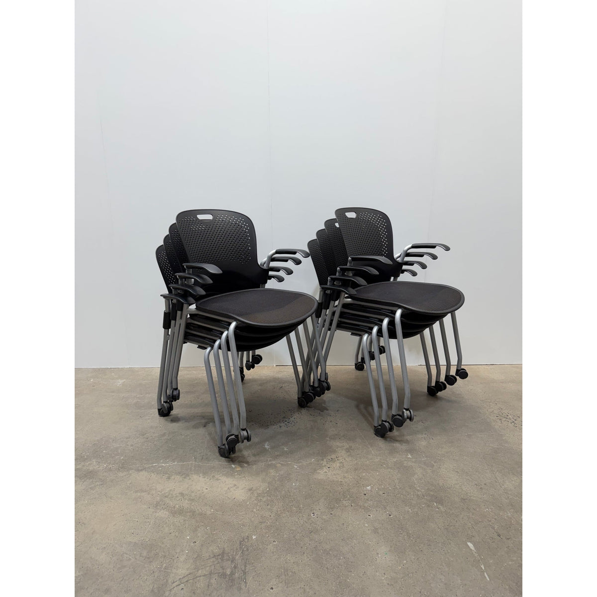 Herman Miller Caper Stacking Chair, Black, Fixed Arms, Castors - thegoodchairs
